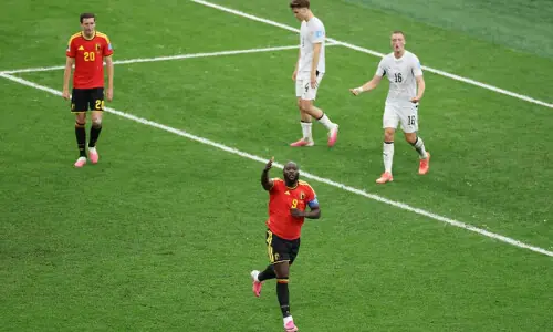 Belgium into World Cup last 32 with New Zealand rout