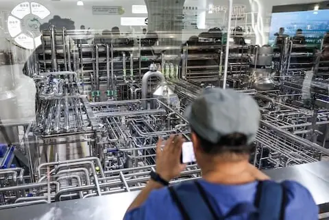 China's June factory activity rises to 50.3