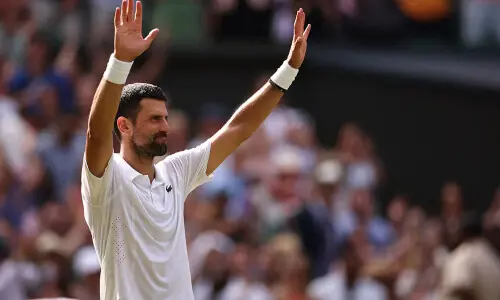 Djokovic makes Wimbledon history to reach quarter-finals