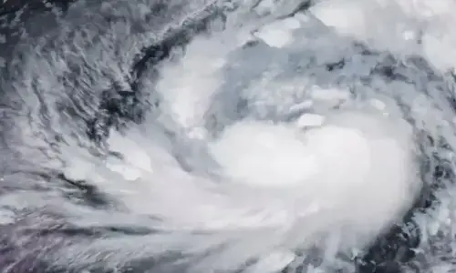Storms kill at least eight in central China as Typhoon Bavi looms offshore