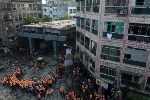 Four die in Delhi building collapse as rains batter India, trigger landslides