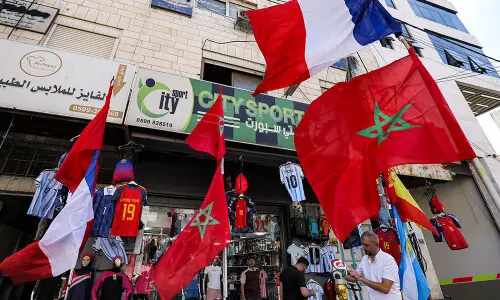 France urges calm during World Cup game against Morocco