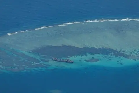 Rescuers scour South China Sea for 23 missing after Vietnamese vessel sinks