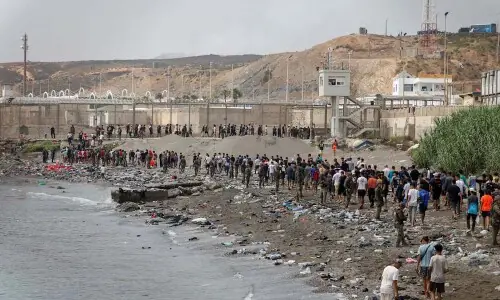 Spain says migrants returning from Ceuta after 57 die in border rush