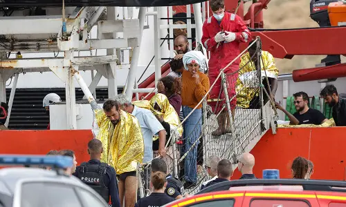 Nearly 160 migrants rescued after boat catches fire during Channel crossing