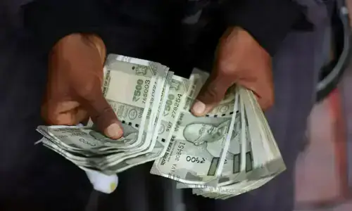 Indian rupee sails past 95 to one-month high, premiums drop before RBI decision