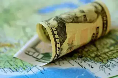 Rupee records gain against US dollar