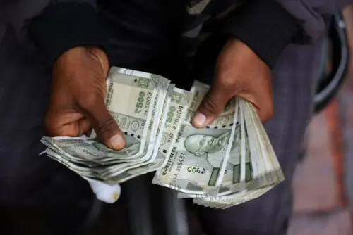 Indian rupee set to weaken after central bank curtails dollar inflow window
