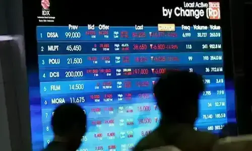 Asian equities slide on higher yields