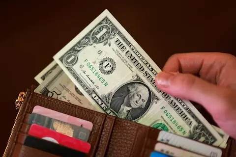 Dollar struggles for traction as markets weigh Iran sanctions, Treasury buybacks