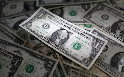 Dollar flat near one-week high as investors await Warsh's Jackson Hole debut