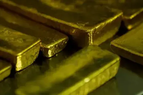 Gold hits near two-week low on Fed chief's hawkish stance Gold hits near two-week low on Fed chief's hawkish stance