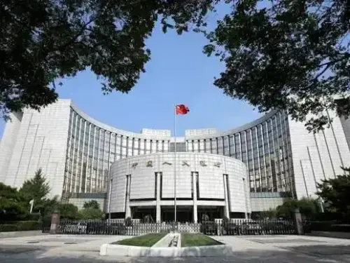 China to pump USD54bn into state banks, insurers