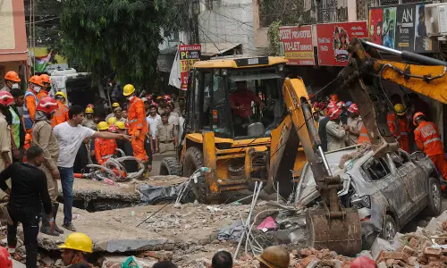 Six killed in Delhi building collapse, rescuers search through rubble