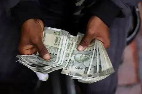 Indian rupee falls past 95/USD as oil climbs, RBI taps swaps to drain excess cash