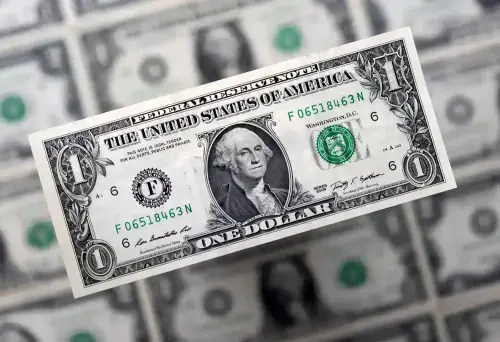 Dollar hovers near seven-month low vs yen