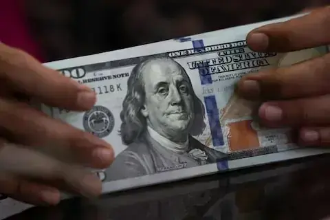 Rupee registers gain against US dollar