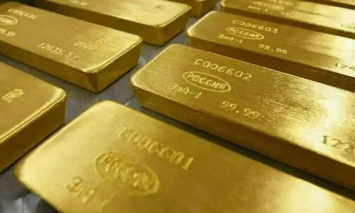 Gold prices decline as higher oil, hawkish Fed weigh