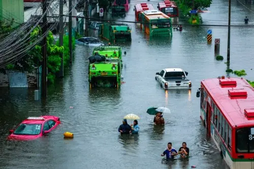 Bangkok floodwaters recede as officials race to drain canals