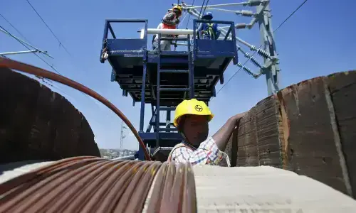 Copper steadies as mine strike threat offsets dollar, oil strength