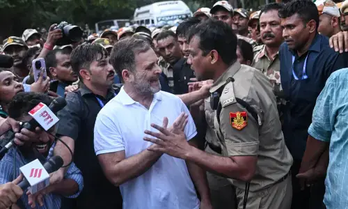 Indian opposition protest police action against lawmakers, push for poll chief's resignation