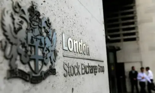 UK stocks close higher as weaker sterling boosts export-heavy sectors