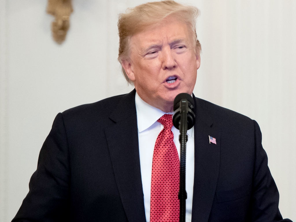 Trump touts US job gains as coronavirus cases hit record highs