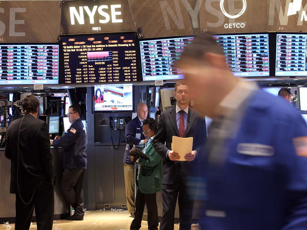 Wall St drops as stimulus delay weighs; Disney soars