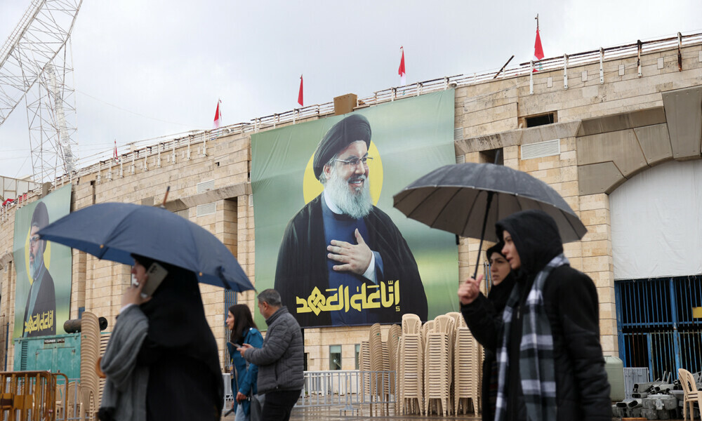 Tens of thousands vow support for Hezbollah at Beirut funeral of slain leader