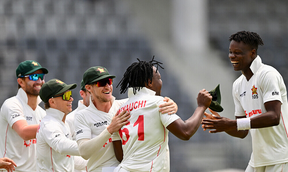 Zimbabwe&rsquo;s Blessing Muzarabani (R) celebrates with his teammates after taking the wicket of Bangladesh&rsquo;s captain Najmul Hossain Shanto during the fourth day of the first Test cricket match between Bangladesh and Zimbabwe at the Sylhet International Cricket Stadium in Sylhet on April 23, 2025. Photo: AFP