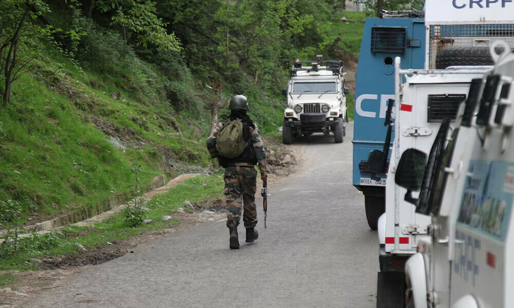  An Indian security force trooper moves past parked vehicles during a cordon and search operation, following an attack on tourists near Pahalgam. Photo: Reuters 