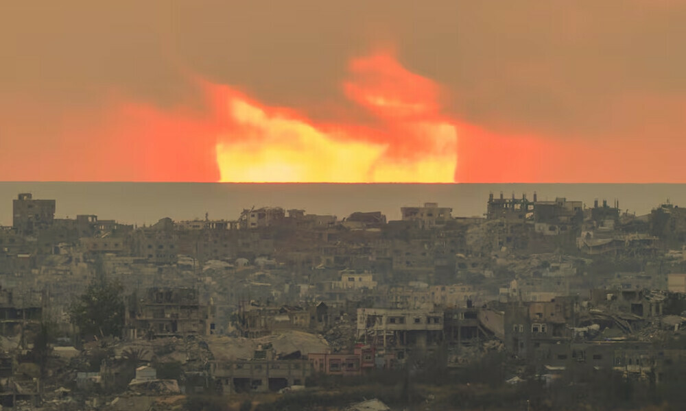 The sun sets over the northern Gaza Strip, as seen from the Israeli side of the border, April 29, 2025. REUTERS