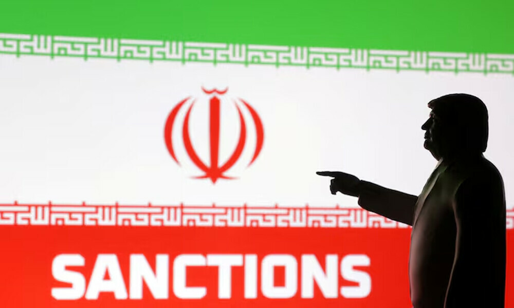 A 3D-printed miniature model depicting U.S. President Donald Trump, Iran flag and word &ldquo;Sanctions&rdquo; in this illustration created April 17, 2025. REUTERS