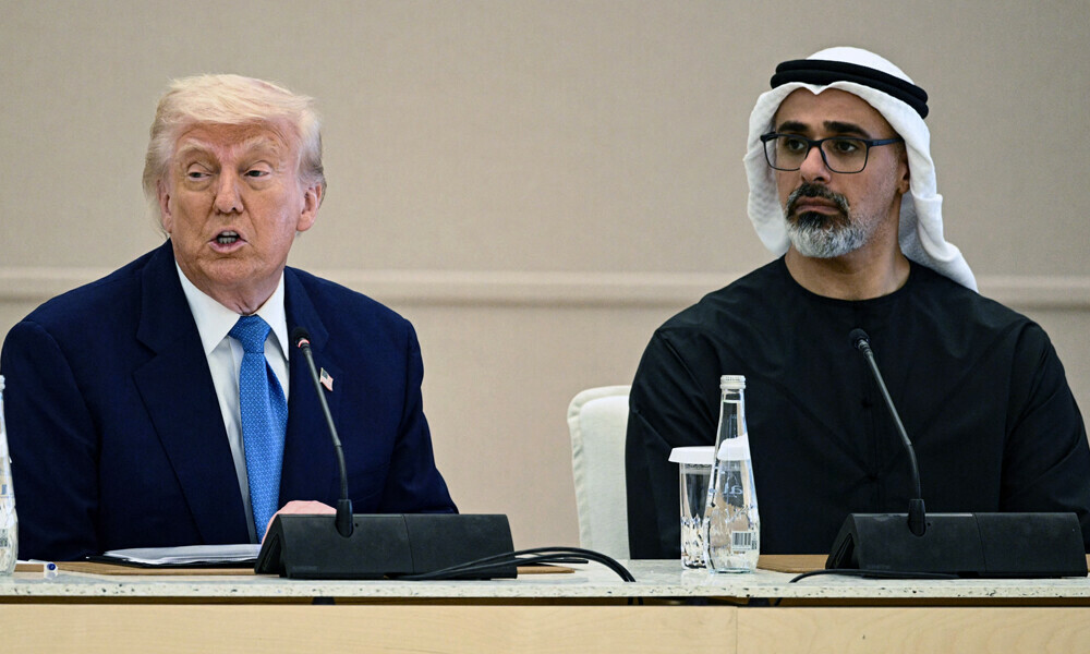 US President Donald Trump (L) speaks as he sits next to Abu Dhabi’s Crown Prince Sheikh Khaled bin Mohamed bin Zayed Al Nahyan during the business dialogue forum in Abu Dhabi on May 16, 2025. Photo: AFP