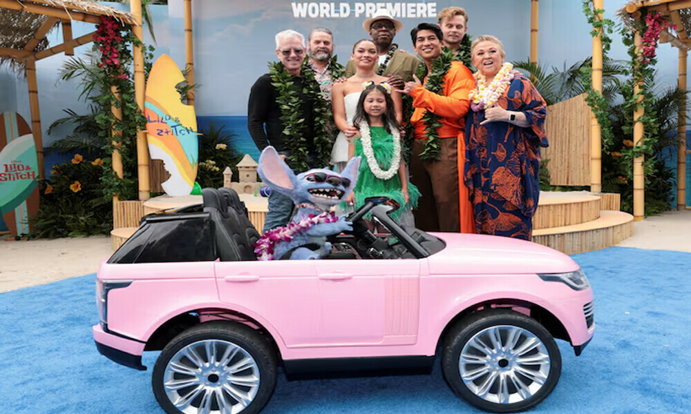 Chris Sanders, Billy Magnussen, Zach Galifianakis, Maia Kealoha, Sydney Agudong, Courtney B. Vance, Kaipo Dudoit, Amy Hill and Stitch attend a premiere for the film &ldquo;Lilo & Stitch&rdquo; in Los Angeles, California, U.S. May 17, 2025. REUTERS