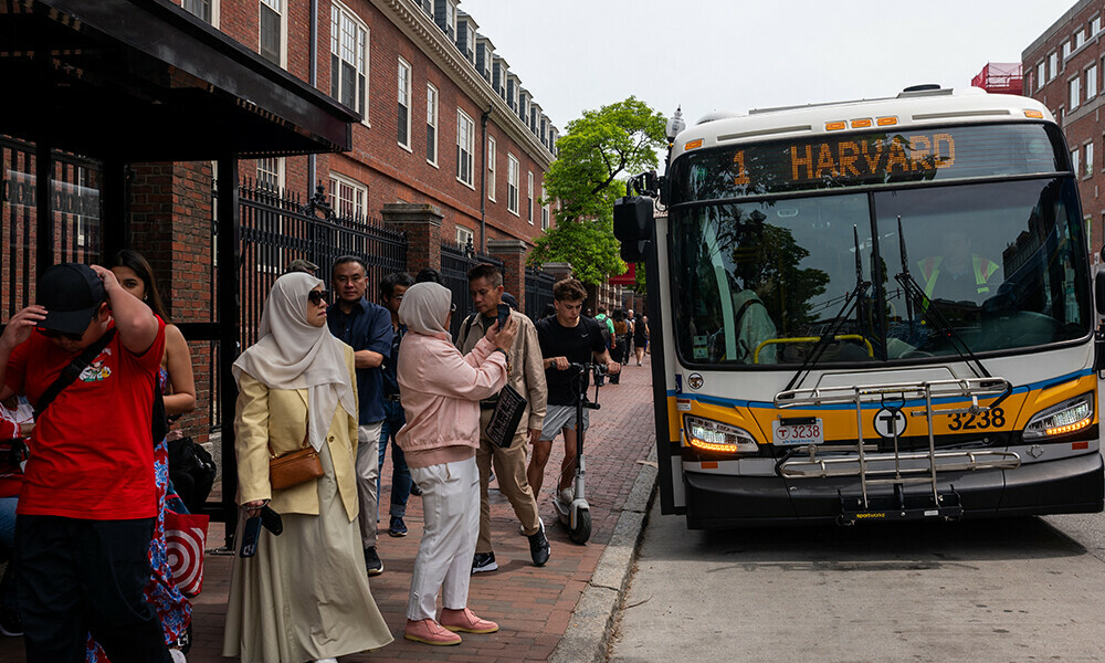 People walk through the Cambridge neighborhood of Boston, home to Harvard University on May 28, 2025 in Boston, Massachusetts. Photo: AFP