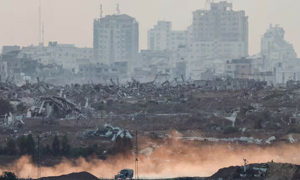 A military vehicle manoeuvres in Gaza, as seen from the Israeli side of the border. REUTERS