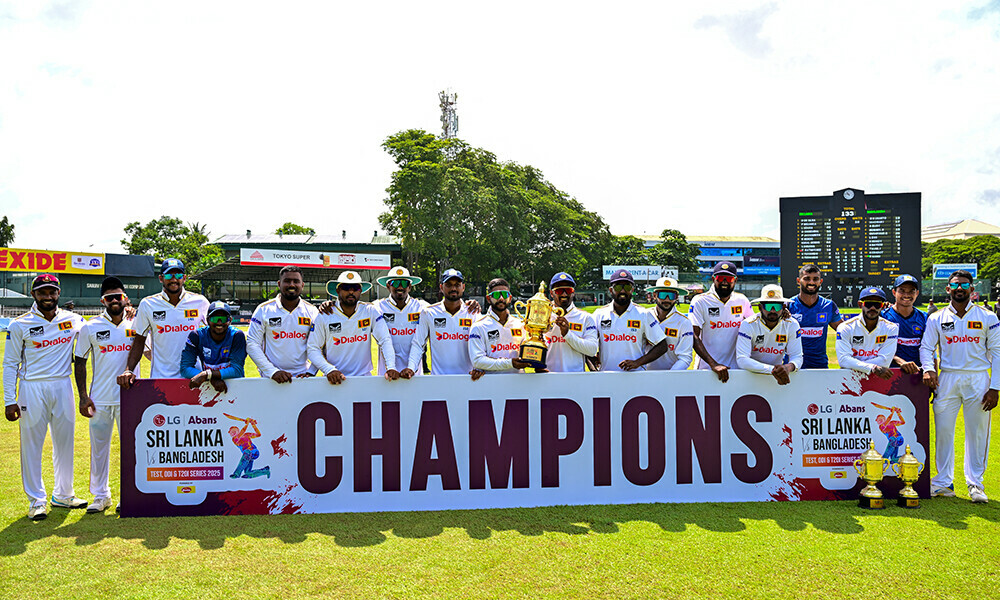 Sri Lanka&rsquo;s players pose with the trophy after their win in the end of the fourth day of the second Test cricket match against Bangladesh at the Sinhalese Sports Club (SSC) in Colombo on June 28, 2025. Photo: AFP