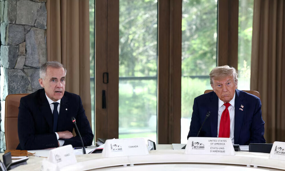 U.S. President Donald Trump and Canadian Prime Minister Mark Carney attend a meeting with G7 leaders and guests, at the G7 summit in Kananaskis, Alberta, Canada, June 16, 2025. REUTERS