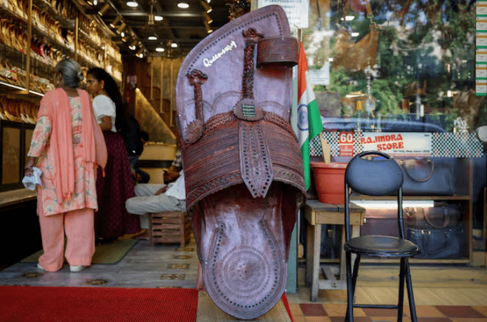Customers shop for &lsquo;Kolhapuri&rsquo; sandals, an Indian ethnic footwear, at a store in New Delhi, India, June 27, 2025. Photo: Reuters