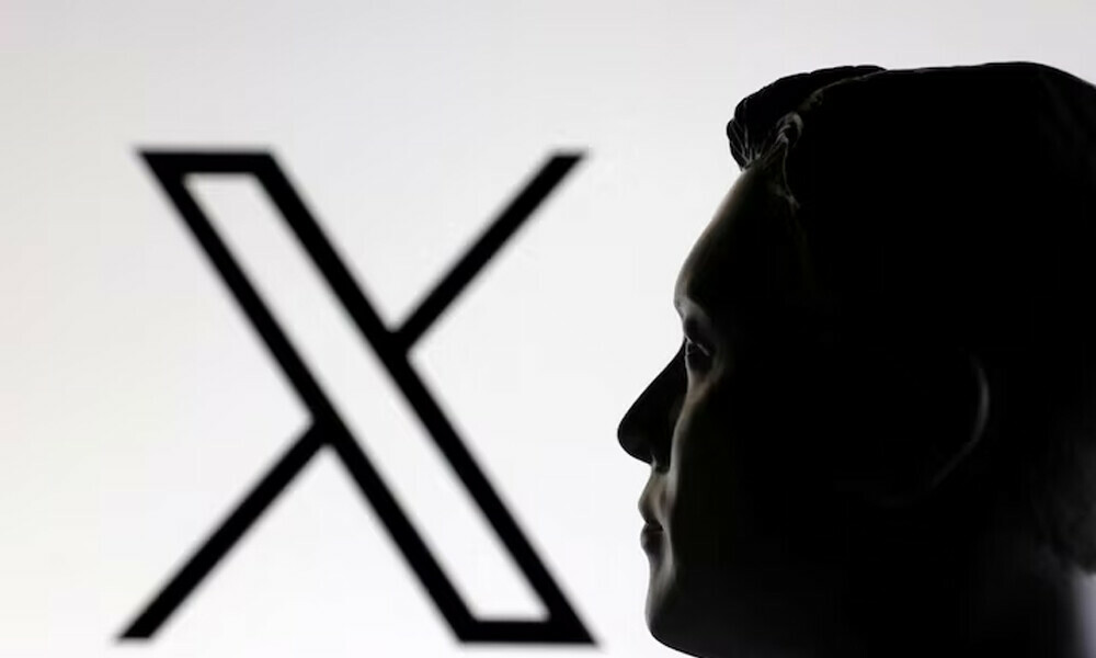 A 3D-printed miniature model of Elon Musk and the X logo are seen in this illustration taken January 23, 2025. REUTERS
