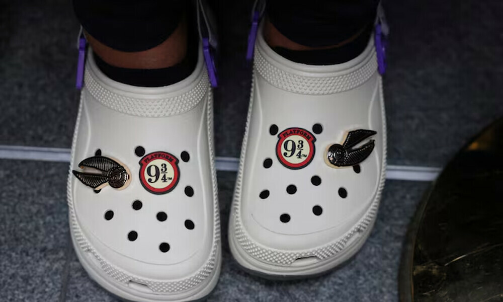 A Harry Potter fan wears Crocs with ‘Platform 9 3/4’ number on them during Back to Hogwarts Day at Kings Cross Station in London, Britain, September 1, 2023. REUTERS A Harry Potter fan wears Crocs with ‘Platform 9 3/4’ number on them during Back to Hogwarts Day at Kings Cross Station in London, Britain, September 1, 2023. REUTERS