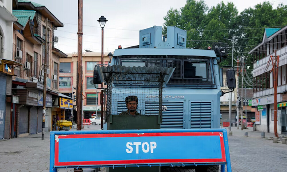 An Indian security personnel stands guard on a street, following clashes between India and Pakistan, in Srinagar, Kashmir May 9, 2025. REUTERS