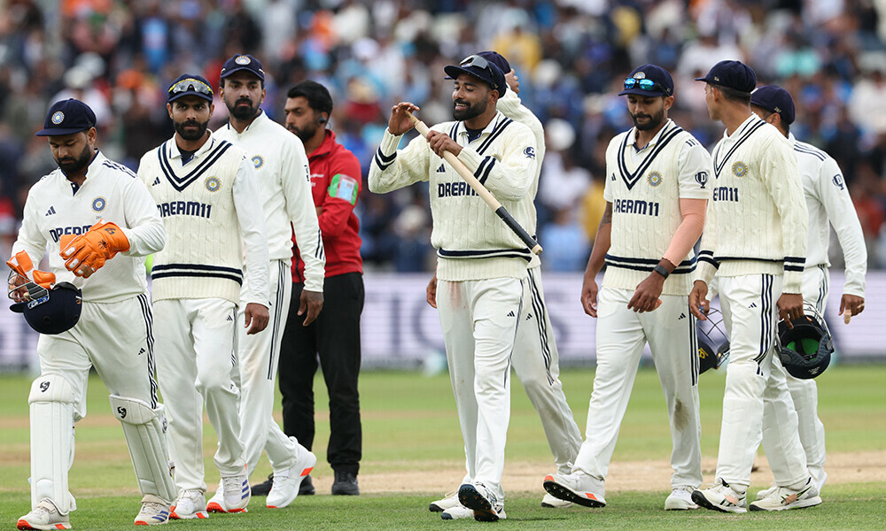 India&rsquo;s Mohammed Siraj holds a souvenir stump as players leave the field as India win the test by 337 runs, on day five of the second cricket test match between England and India at Edgbaston cricket ground in Birmingham, central England on July 6, 2025. Photo: AFP