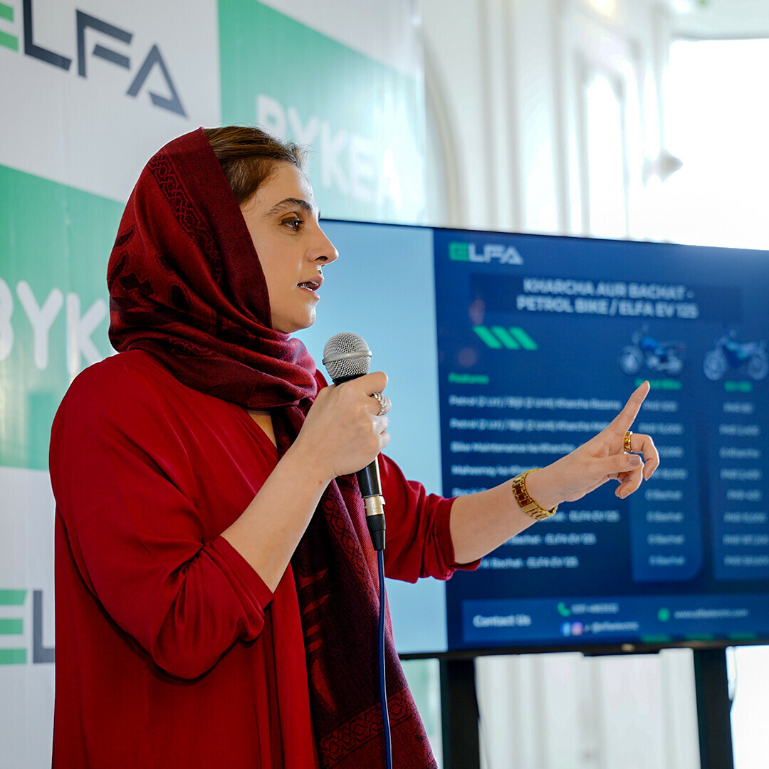   Huma Yahya Khattak, CEO EV Technologies, briefing Bykea driving-partners about ELFA electric bikes  