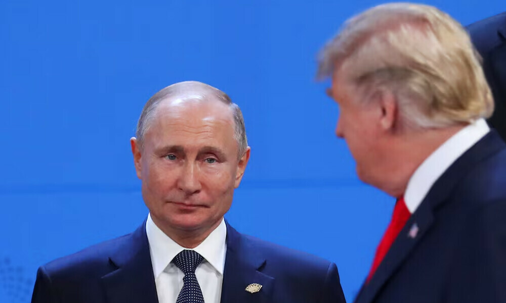 Donald Trump and Russia&rsquo;s President Vladimir Putin are seen during the G20 leaders summit in Buenos Aires, Argentina November 30, 2018. REUTERS