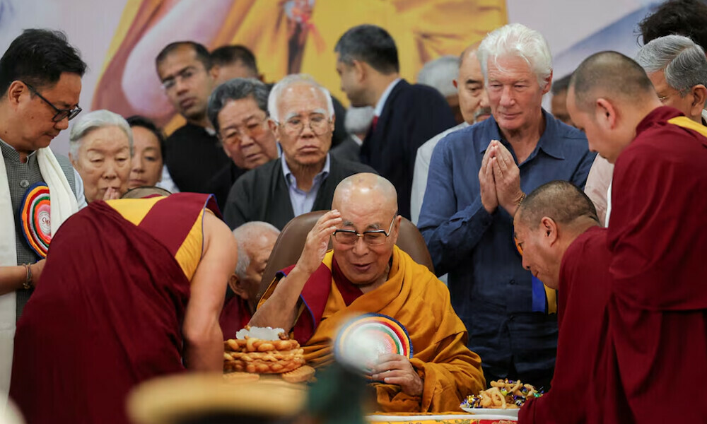 Tibetan spiritual leader, the 14th Dalai Lama, is served food on his 90th birthday celebration at the Tsuglagkhang, also known as the Dalai Lama Temple complex, in the northern town of Dharamshala, India, July 6, 2025. Photo: Reuters