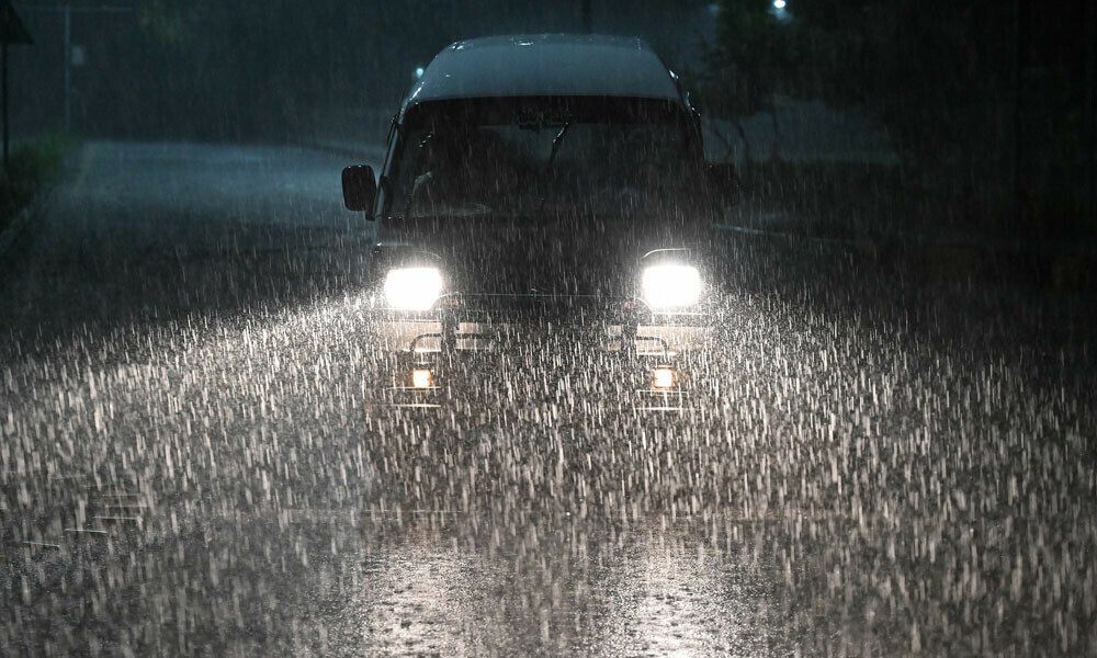 A motorist drives along a road amid heavy monsoon rains in Islamabad on July 9, 2025. Photo: AFP A motorist drives along a road amid heavy monsoon rains in Islamabad on July 9, 2025. Photo: AFP