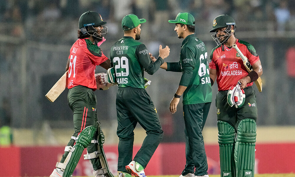 Bangladesh&rsquo;s Parvez Hossain Emon (R) and Jaker Ali (L) shake hands with Pakistan&rsquo;s Mohammad Haris (2L) and Saim Ayub at the end of the first Twenty20 international cricket match between Bangladesh and Pakistan at the Sher-e-Bangla National Cricket Stadium in Dhaka on July 20, 2025. Photo: AFP