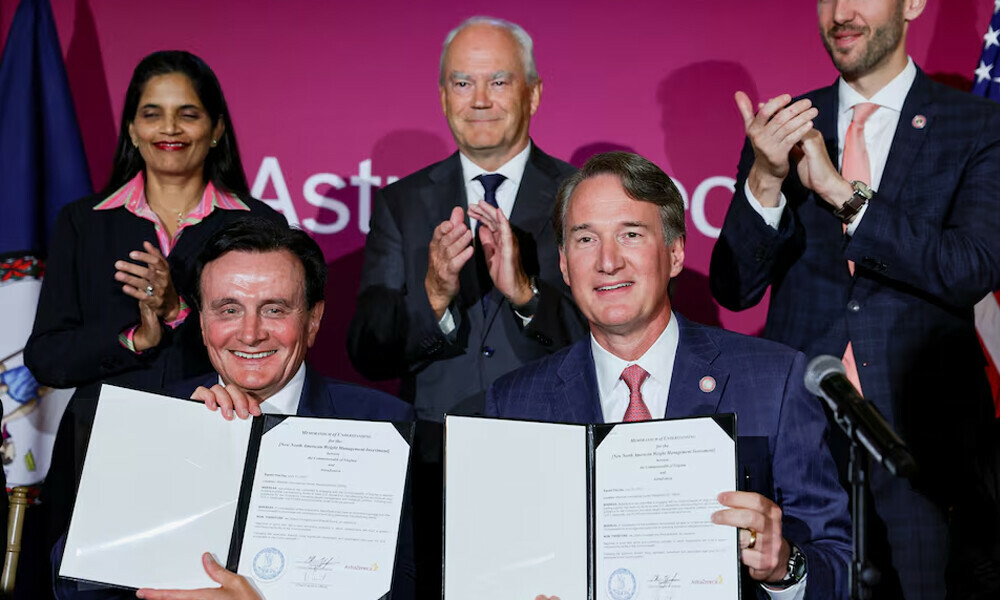 AstraZeneca CEO Pascal Soriot and Virginia Governor Glenn Youngkin show documents related to a manufacturing site investment after signing them during an event at the Meridian International Center, in Washington, DC. Photo: Reuters